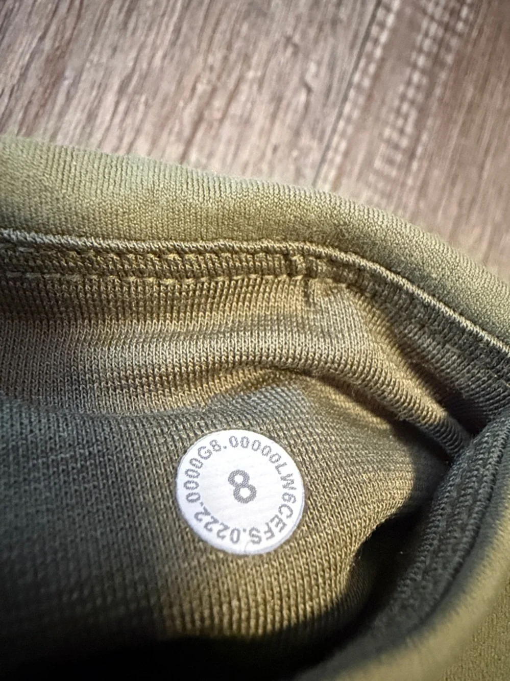 Lululemon Align High-Rise Cropped Jogger Capris in a bronze green color.